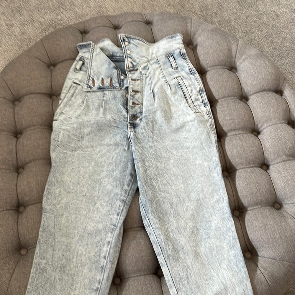 Express super high waisted acid wash jeans.